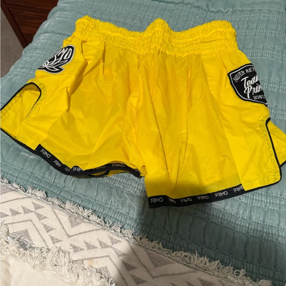 Primo Muy Thai Women's Yellow Athletic Shorts with Red Logo